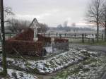 Eine Grabstelle im winterlichen M�nsterland bei L�dinghausen am 12.01.2003.