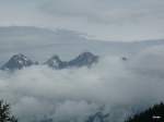 Die Bergspitzen aus den Wolken
